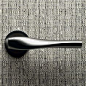 MAD Architects has created a door handle based on the shape of the firm's skyscrapers in Mississauga, which have been nicknamed the Marilyn Monroe Towers