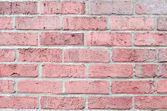 复古粉彩砖墙水平。设计的背景。