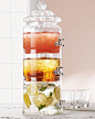 A 3-Tier Stacked Glass Drink Dispenser