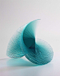 Artist Niyoko Ikuta Uses Layers of Laminated Sheet Glass to Create Spiraling Geometric Sculptures: 