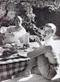 Audery Husband relaxes with husband Mel Ferrer, 1950s.