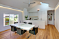 Kitchen/dining room combo - mid-sized contemporary light wood floor kitchen/dining room combo idea in Sydney with white walls