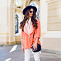 Free photo outdoor hight fashion portrait of stylish casual woman in black hat, pink suit, white blouse posing on old street