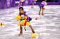 Skaters pick up gifts thrown to the ice for Yuzuru Hanyu of Japan during the Men's Single Skating Short Program at Gangneung Ice Arena on February 16...