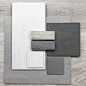 This may contain: some gray and white materials are laying out on the floor with one piece of wood in front of them
