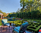 English Tudor Residence & Garden : English Tudor Estate Garden - Architecture by Dobbins+Crow Architects. Project features glass tile pool, antique brick, outdoor cabana, dining area, boxwood parterre and privacy screen planting.