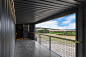 cumulus studio's vineyard observatory frames views of australian peninsula : the structure is designed as a loose collection of timber clad buildings that, through similar aesthetic and material treatment, form a modern interpretation of traditional farm.