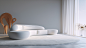 LS_a_large_room_with_a_white_couch_and_wall_in_the_style_of_sof_fb14778e-b9be-4424-9eb5-ea1d47a00aee