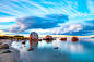 Bright colored sea sunset with stones along the coast by Nick Yegorov on 500px