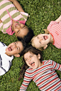 Children Lying in Clover Screaming With Heads Together by Ron Chapple on 500px