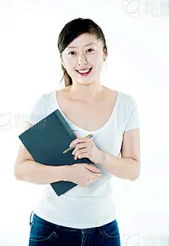 Young woman holding books