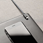 Leather Mouse Pad with Magnetic Cable Management : Spruce up your desk space with elago's Genuine Leather Mouse Pad. Here you can expect a little more than what the product was made for. A stamped "M" indicates 
