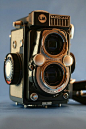 The Yashica 44, 44A, and 44LM were a series of small twin-lens reflex cameras, designed to give 12 exposures of 4x4 cm on 127 rollfilm.  Yashica introduced the model 44 in 1958 as Japan's first 4x4 TLR.[1]. The camera was offered in several color options,