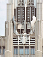 With its central tower and figurative winged sculpture