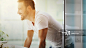 Cheerful man in bathroom._创意图片
