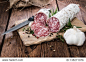 Portion of Salami Slices with fresh Herbs and Garlic