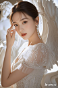 美丽的模特，东方女生，温柔，气质，高定礼服，大眼睛，甜美，唯美意境，高级感，面部细节完美，人物细节精致，清透，奇幻的光影，细腻的光泽，磨砂质感，高级感背景，艺术感背景，高级感色调，丘比特雕塑，高度细节