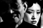 马克·吕布镜头下的名人 - 新摄影巩俐（1995）这张照片前面被虚化的人是老演员陈述