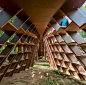NUDES fabricates the 'bookworm' pavilion to foster a love of reading in india designboom