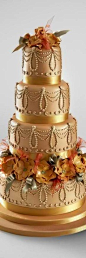 Gold-themed wedding cake..