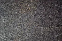 枯燥乏味的纹理背景。质朴的混凝土纹理照片为背景。天然石材表面有滴水和污垢。抽象的深色垃圾纹理的墙壁。
