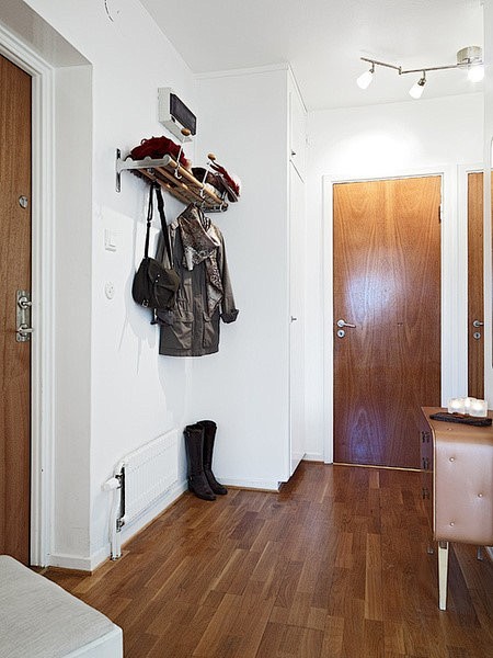 [54平米紧凑型单身公寓进门玄关装修效果...