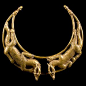 Circa 2nd century BCE - 1st century CE, Scythian - Hundreds of tiny scales are individually soldered to the writhing forms of two confronted dragons on this magnificent gold torc. Thick curving horns sweep back over the long pointed ears of the rather wol