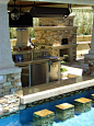 Outdoor kitchen, fireplace, pool bar.