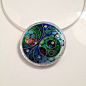 Large cloisonne enamel pendant in an innovative lasercut lucite and silver setting.: 