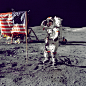 Cernan Jump Salutes Flag : Eugene A. Cernan, Commander, Apollo 17 salutes the flag on the lunar surface during extravehicular activity (EVA) on NASA's final lunar landing mission. The Lunar Module "Challenger" is in the left background behind th