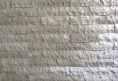 黄色和浅棕色的砖墙作背景