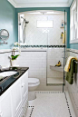 Nice design for a small bathroom that doesn't use a pre-fab shower - like the tile work and the seat in the shower. Also nice colors and good natural light.: 