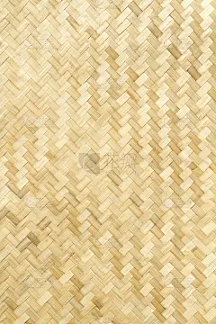 以自然材料为背景的棕色编织图案