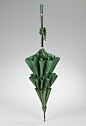 Parasol - American Made c.1915-1920. The ruffles of the canopy of this parasol were particularly stylish during the teens, and the overall style echoes the skirts of wartime crinolines. Continuing the green color scheme, the jade handle is very attractive