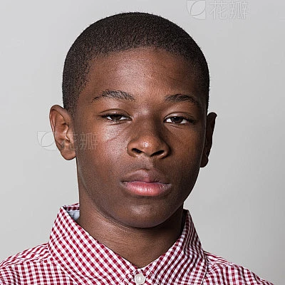 African american teenage boy on gray background