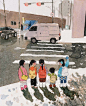 This may contain: a group of children waiting to cross the street at an intersection on a snowy day