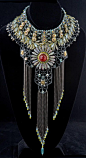 I'm not big on large necklaces but this is an attractive piece of jewelry. Necklace | Susan Blessinger. "Impending Bloom" //: