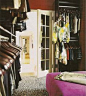 Jennifer Marsico's organized closet with leopard-print rug and bright pink ottoman, as shown in Domino Magazine, April 2007 #closet #dressing_room