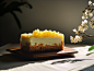 A simple Chinese-style osmanthus cake, with the shadow of osmanthus flowers, light brown and golden hues, a blurred background, delicate sheen, shallow depth of field, morning light, and natural light. --ar 4:3 --v 5 