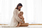 Young mother breastfeeding her newborn baby boy at home by Tatyana Tomsickova on 500px
