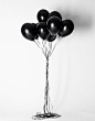 Black balloons.