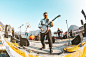 Man Playing Banjo Near Person Standing in Front of Microphone