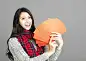 asian woman showing red envelopes for chinese new yearasian woman showing red envelopes for chinese new year