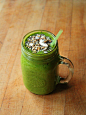 Green Smoothie (1 cup orange juice, scoop of pumpkin seed protein powder, 1 cup baby spinach, 2/3 cup frozen mango, 3 tbsp soy yogurt) topped with Qi&#;8217a cereal.