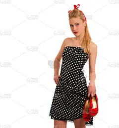 复古风格的海报女郎在黑色连衣裙与白点