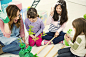 Children learning about planting a tree in a kindergarden