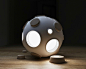 白俄罗斯工业设计师 Constantin Bolimond 设计的“月球灯”，以陶瓷和软木为材质，通过拔掉“陨石坑”上的软木塞来获得理想的光线～ 产品和包装充满一种具有未来气质的设计感。（bolimond.tumblr.com）【曾介绍过Bolimond的另一个作品，木头伏特加：http://weibo.com/3931672306/AvFSYgTF4】