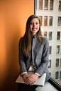 shallow focus photo of woman in gray jacket