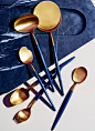 Blue and gold cutlery and board: 