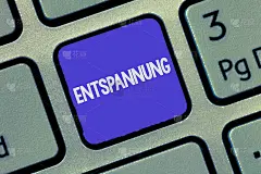 显示Entspannung的文本标志。概念照片Geranalysis术语翻译为放松放松假期休息